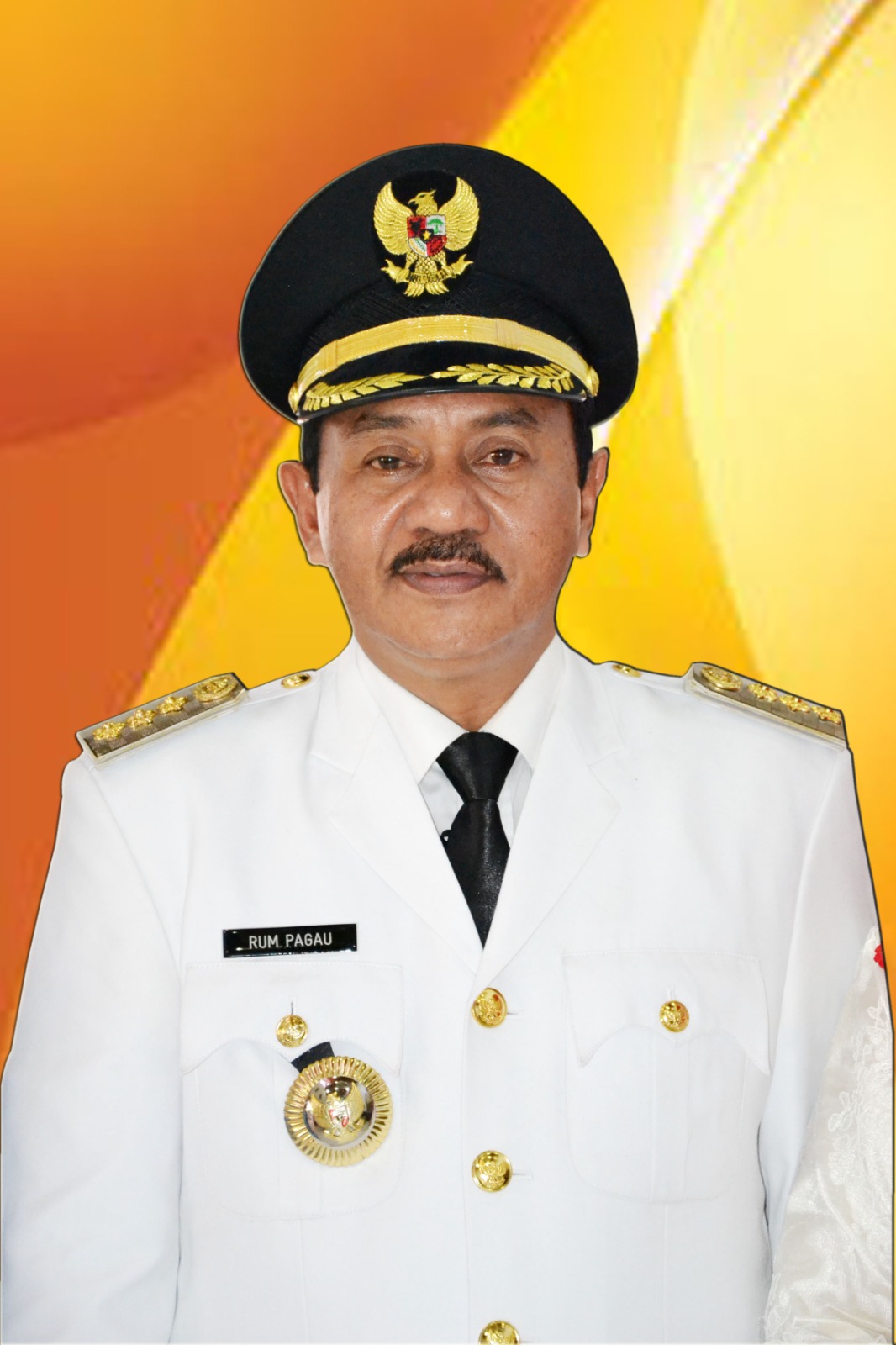 Drs. H. RUM PAGAU